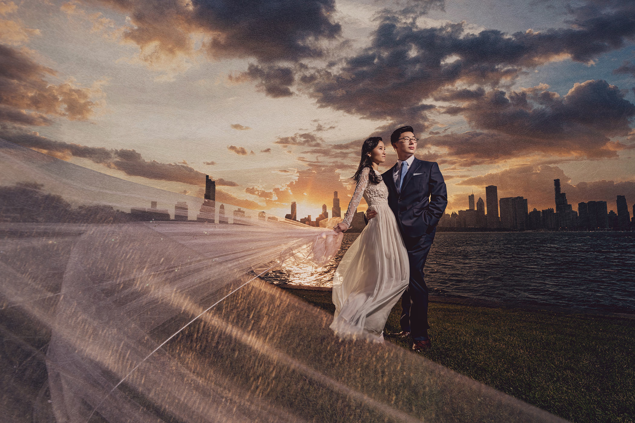 Couple in formal wedding attire at sunset near Museum Campus
