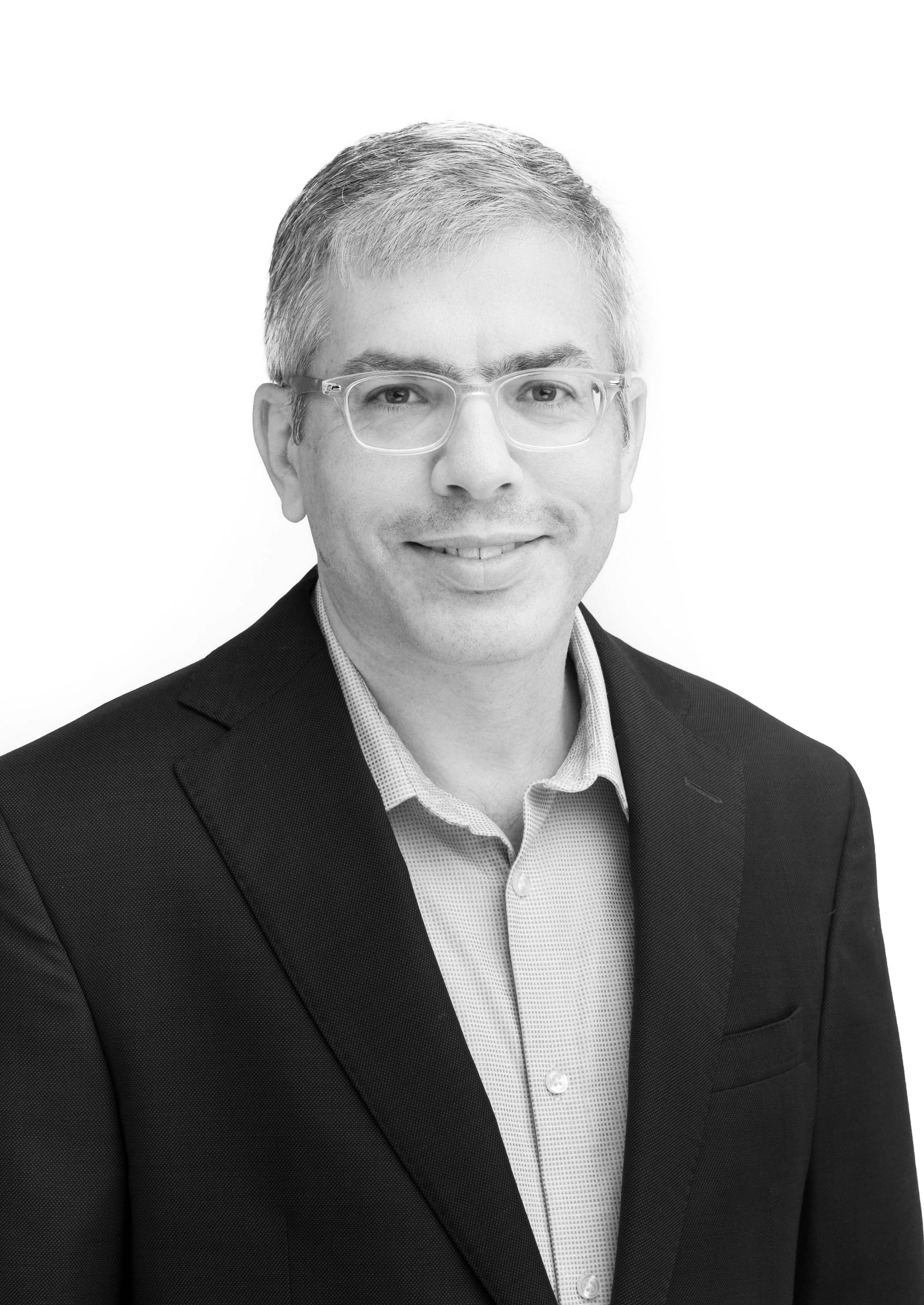 Black-and-white headshot of a man